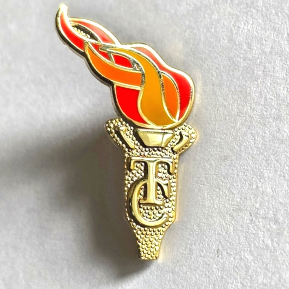 TC torch lapel pin gold tone metal fire brooch